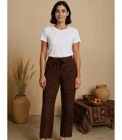 Damesbroek met luipaardprint en strikceintuur