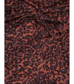 Damesbroek met luipaardprint en strikceintuur