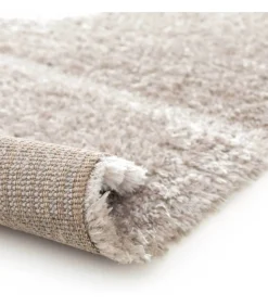 Hoogpolig vloerkleed met taupe geometrisch patroon 120 x 170 cm