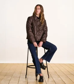 Korte donsjas met luipaardprint en afneembare mouwen