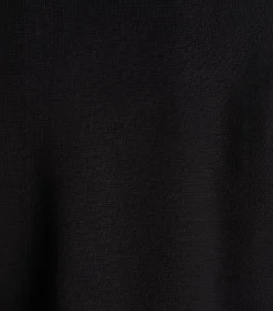 Korte zwarte gilet in gebreide stof met overhemdkraag