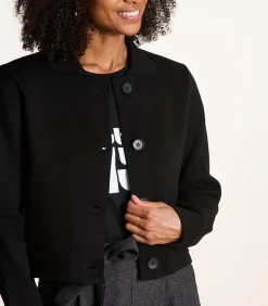 Korte zwarte gilet in gebreide stof met overhemdkraag