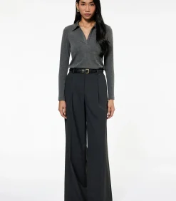 Lange mouwen polo zwarte dames top met steendetails