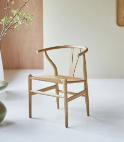 Stoel van licht massief teakhout met vlechtwerk Blaise
