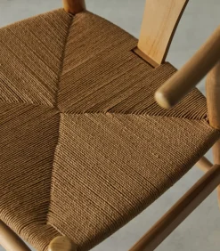 Stoel van licht massief teakhout met vlechtwerk Blaise