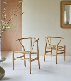 Stoel van licht massief teakhout met vlechtwerk Blaise