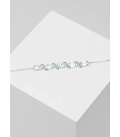 Witgouden armband met diamanten en topaas