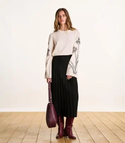 Zwarte midirok van geplooide stof